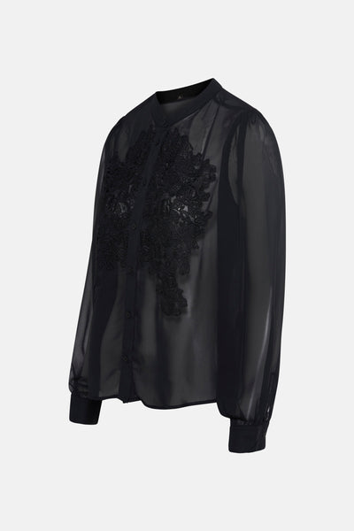 Chemise noire à manches longues de MEXX ornée de broderies florales sur le devant.
