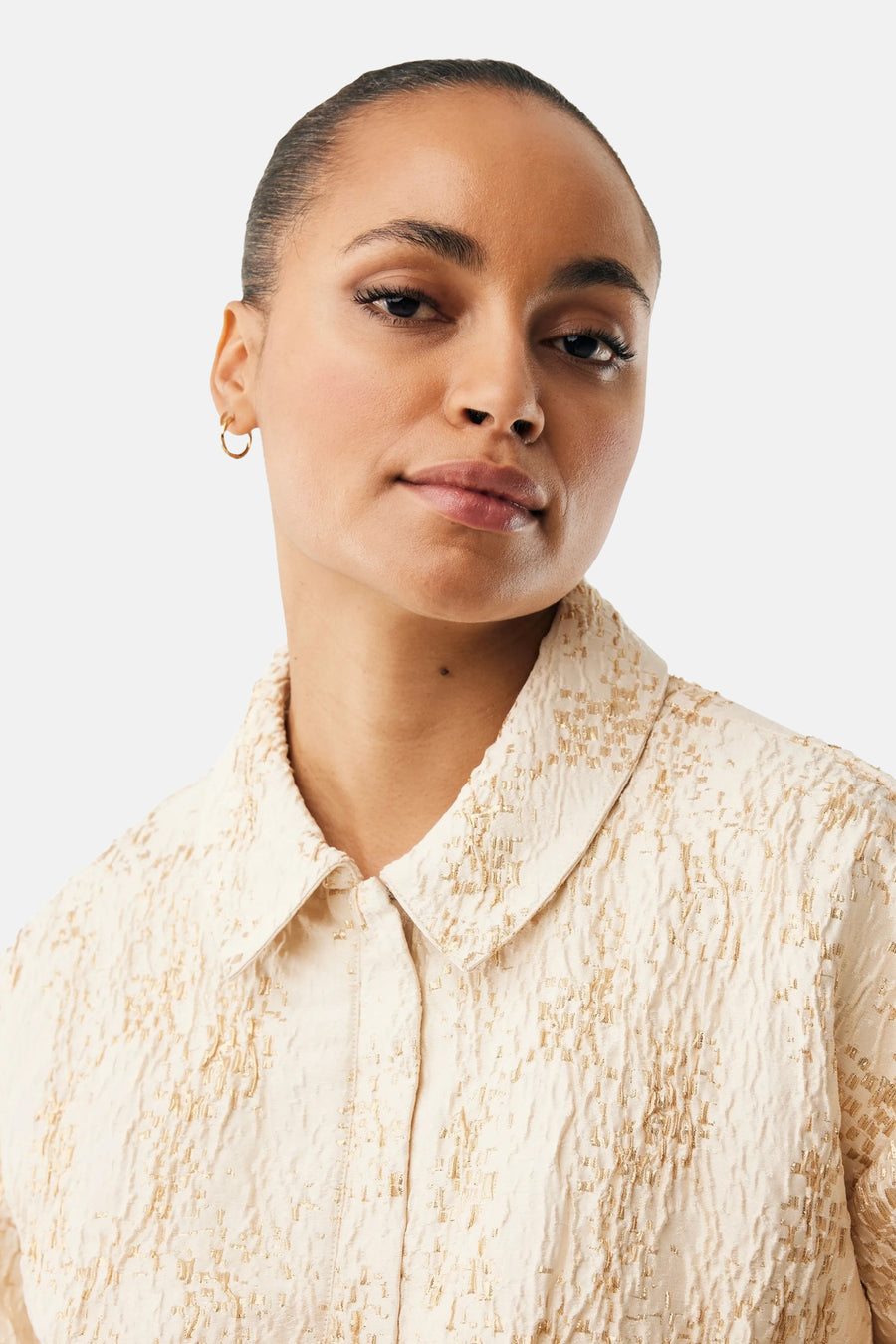 Veste beige de MEXX avec motif texturé et col classique.