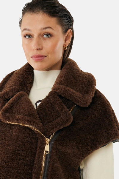 Bruin nepbonten jas van MEXX, met gouden ritssluiting en leren details.