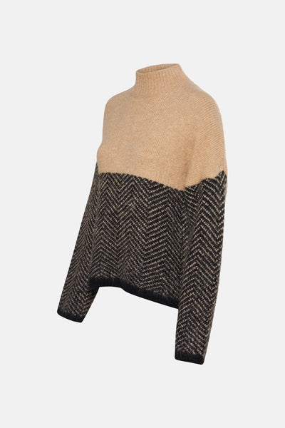 Pull à col roulé multicolore de MEXX, avec motif à chevrons sur la partie inférieure.