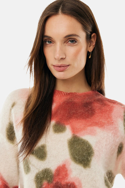 Multikleuren col rond pull van MEXX met gespikkeld patroon en pluizige textuur.