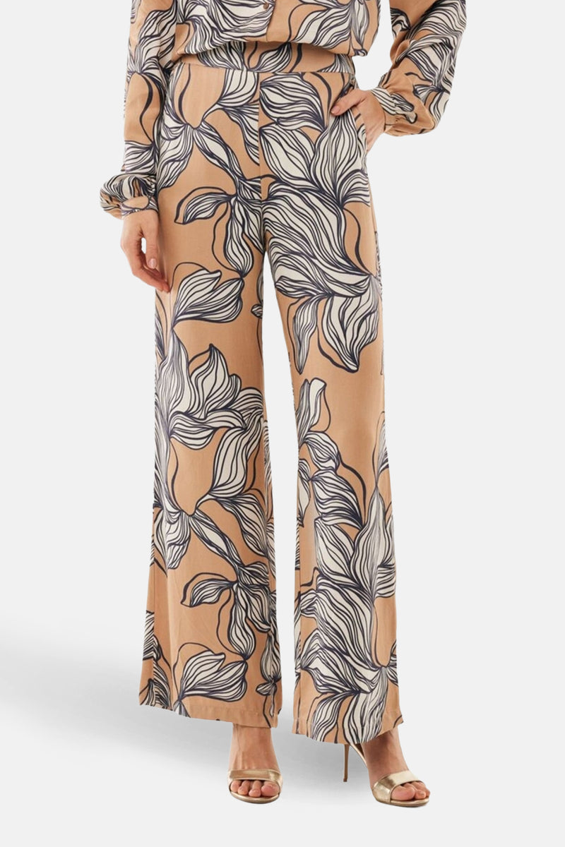 Multikleurige broek van MEXX met een abstracte bloemenprint in de kleuren beige, gebroken wit en marineblauw.