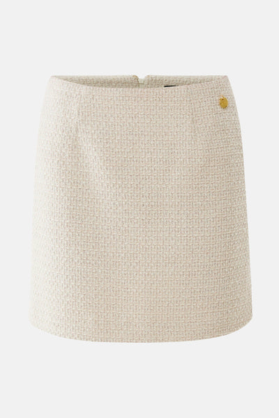 Jupe courte écru de MEXX en tweed avec un bouton doré sur le côté.