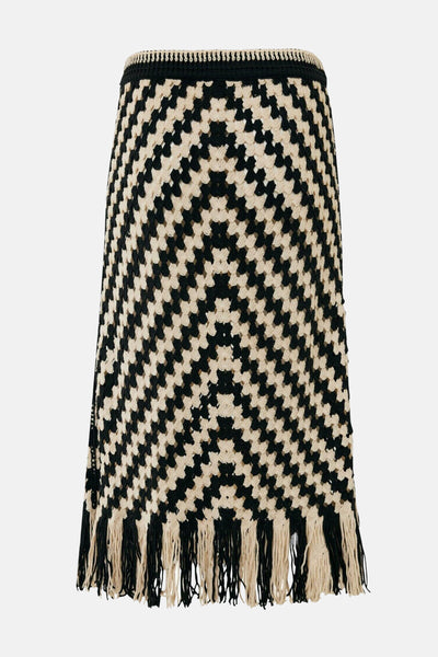 Jupe 3/4 en crochet noir et beige de Mexx, motif géométrique à chevrons et franges décoratives.