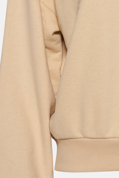 Sweat-shirt beige col rond de MEXX, avec texture lisse et finitions côtelées.