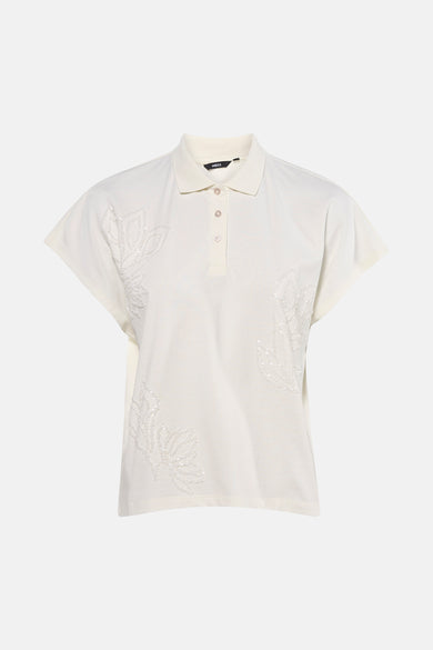 T-shirt blanc de Mexx, avec des motifs floraux brodés de perles ton sur ton.
