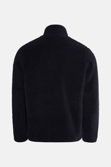 Veste en polaire bleu de Barbour, avec une texture bouclée et une coupe confortable.