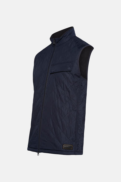 Blauwe mouwloze jas van Barbour International, ruitvormig doorgestikt patroon en discrete borstzak.