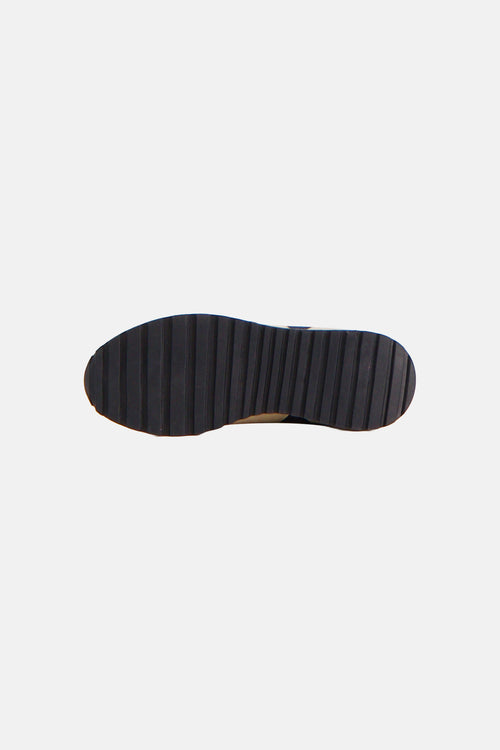Blauwe sneakerzool van MEXX, met verticaal strepenpatroon.