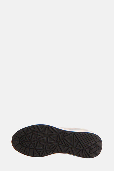 Baskets écru de Mexx avec une semelle à motifs triangulaires noirs.