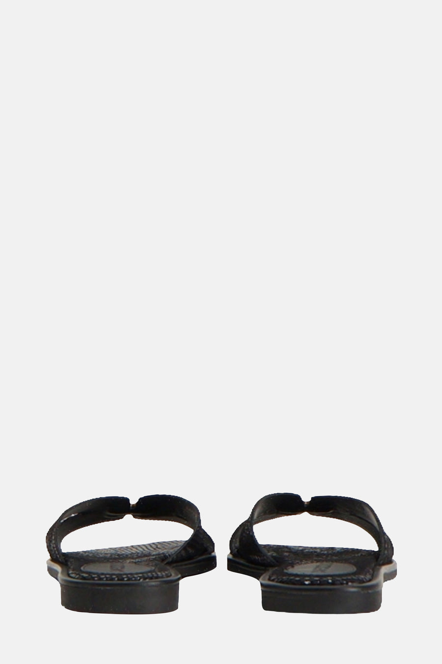 Sandales noires de MEXX, avec des détails texturés sur la semelle et la bride.