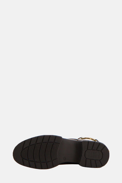 Bottines noires de MEXX, semelle texturée avec inscription « You Look Good Today » en relief.
