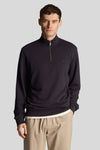 Blauwe sweater met opstaande kraag van LYLE & SCOTT, met ritssluiting en discreet logo op de borst.