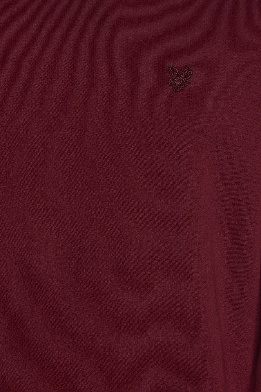 Bordeaux crewneck sweatshirt with subtle butterfly embroidery on chest, close-up view
