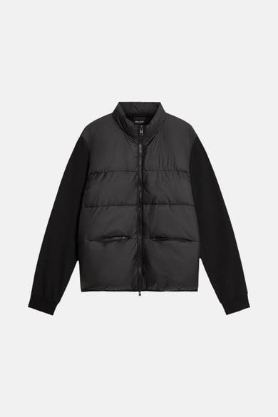 Veste de pluie noire par LYLE & SCOTT avec manches longues en tricot.