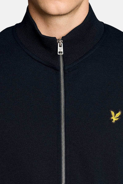 Gilet bleu de LYLE & SCOTT avec fermeture éclair sur le devant et logo brodé.
