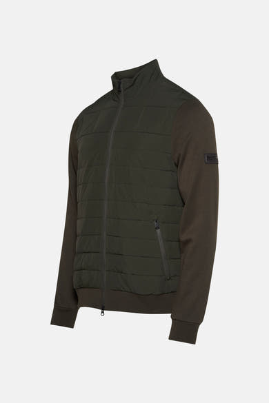 Korte kaki jas van BARBOUR, met lange bruine mouwen en een ritssluiting aan de voorkant.