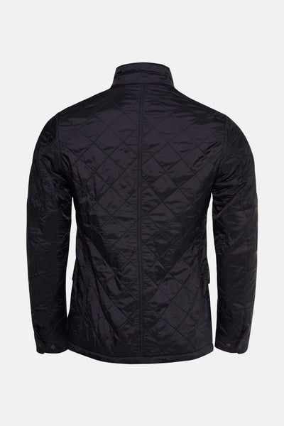 Veste de pluie bleu foncé de Barbour, motif matelassé en losanges, vue de dos.