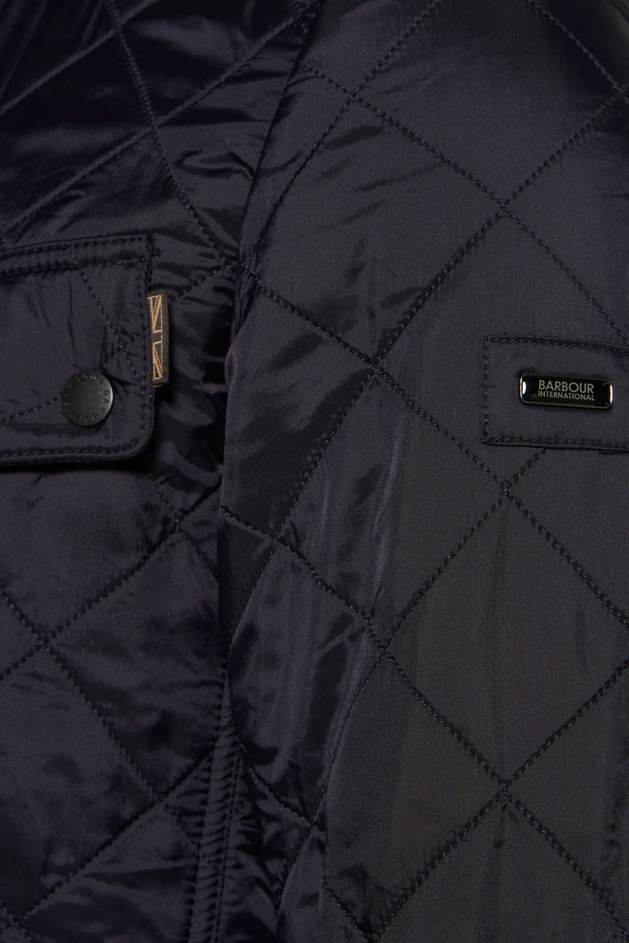 Donkerblauwe regenjas van Barbour, ruitpatroon met zak en knoop.