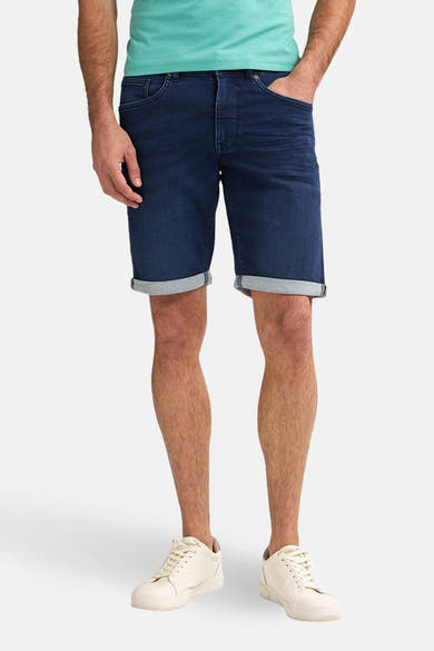 Korte spijkerbroek in blauwe denim van Petrol Industries, met contrasterende omgeslagen zoom.