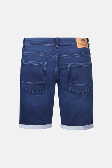Korte spijkerbroek in blauwe denim van Petrol Industries met achterzakken en opgerolde zomen.