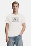 T-shirt blanc de BARBOUR à manches courtes avec illustration de moto et texte "BARBOUR INTERNATIONAL".