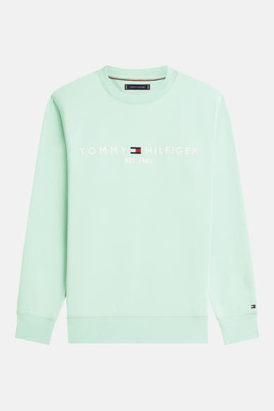 Sweat-shirt vert col rond de TOMMY HILFIGER, avec logo et drapeau emblématique brodé sur le poignet.