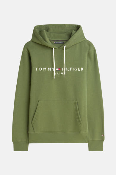 Sweat à capuche vert de Tommy Hilfiger, avec cordon de serrage blanc et logo sur le devant.