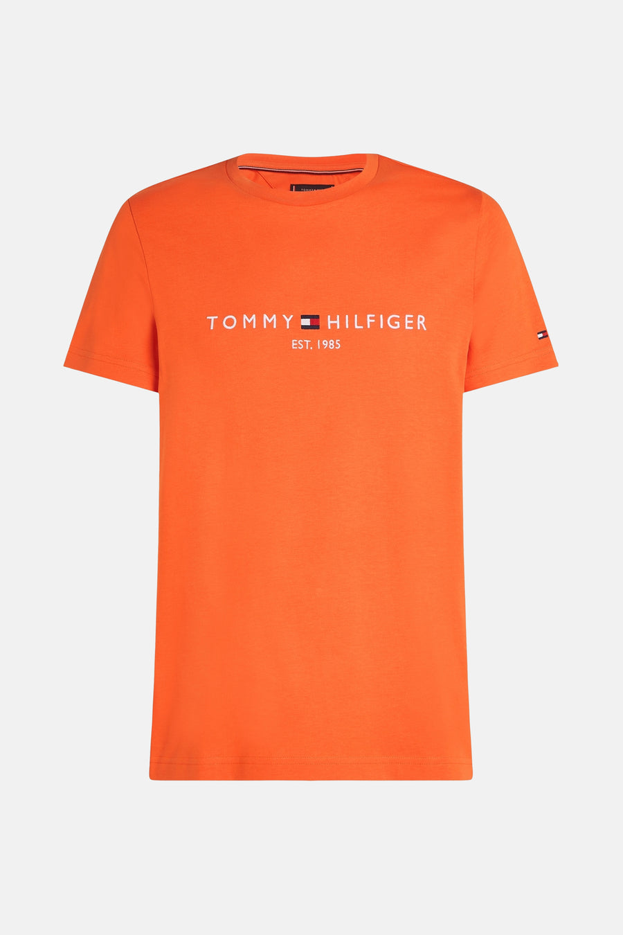 T-shirt orange à manches courtes de TOMMY HILFIGER, avec logo blanc imprimé sur le devant.