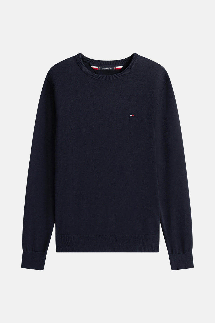 Pull à col rond bleu marine de Tommy Hilfiger, avec le logo discret sur la poitrine.