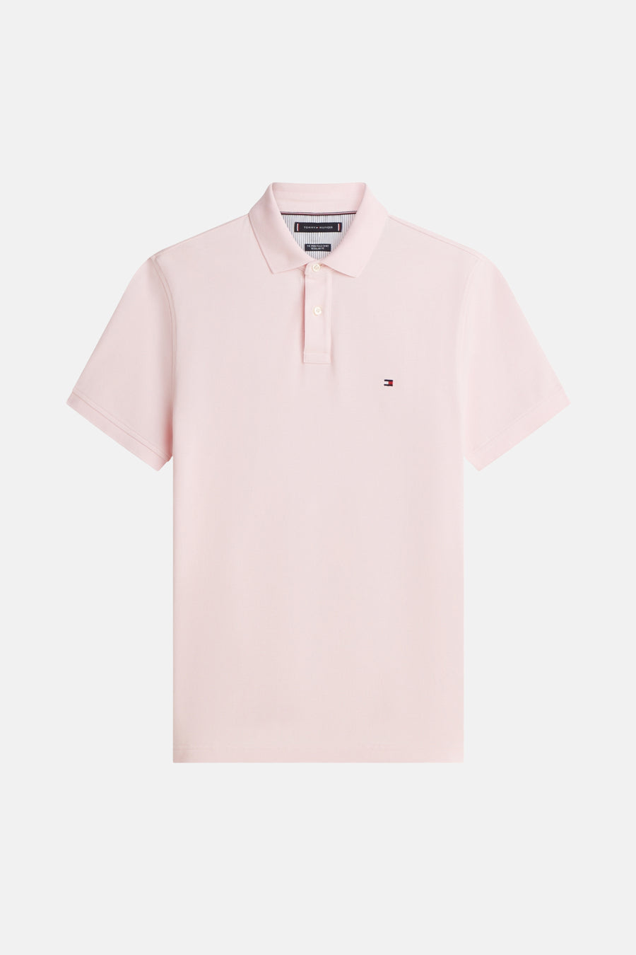 Polo à manches courtes rose de TOMMY HILFIGER, avec logo brodé sur la poitrine.