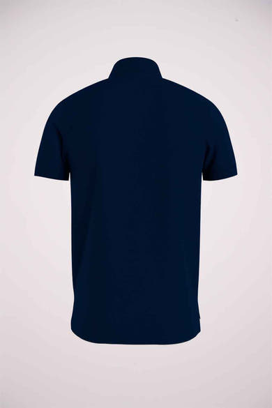 Polo bleu marine de Tommy Hilfiger, avec des manches courtes et un col classique.