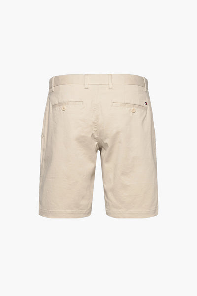Beige cotton bermuda shorts by Tommy Hilfiger, back view with buttoned pockets and flag logo on right pocket