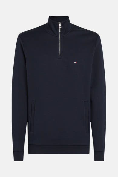 Sweat bleu foncé par Tommy Hilfiger avec fermeture éclair au col et logo discret.