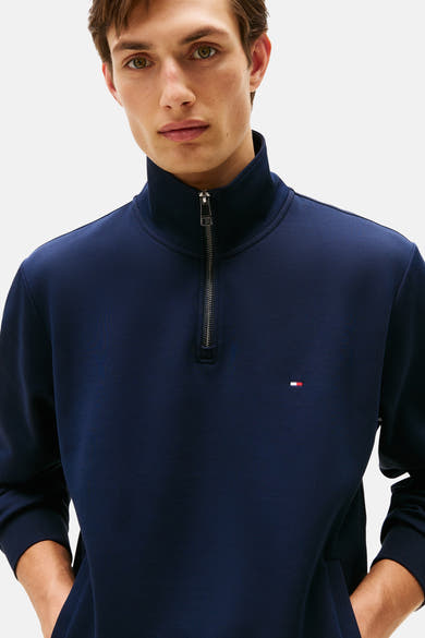 Sweat bleu foncé de Tommy Hilfiger avec fermeture éclair et logo sur la poitrine