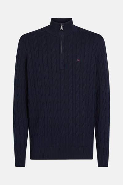 Pull bleu marine en maille torsadée de Tommy Hilfiger avec fermeture éclair partielle et logo discret.