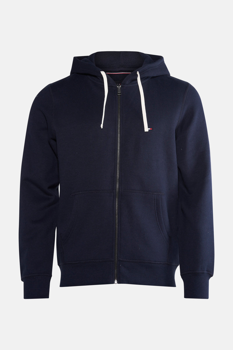Donkerblauwe TOMMY HILFIGER bodywarmer met ritssluiting en capuchon met witte trekkoorden.