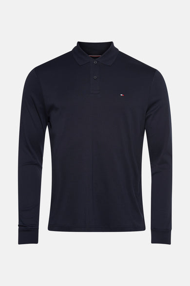 Donkerblauwe polo met lange mouwen van TOMMY HILFIGER met klein discreet logo.