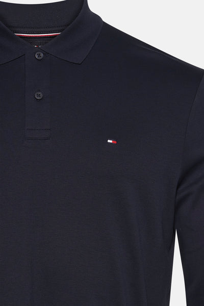 Polo bleu marine à manches longues de TOMMY HILFIGER avec petit logo discret.