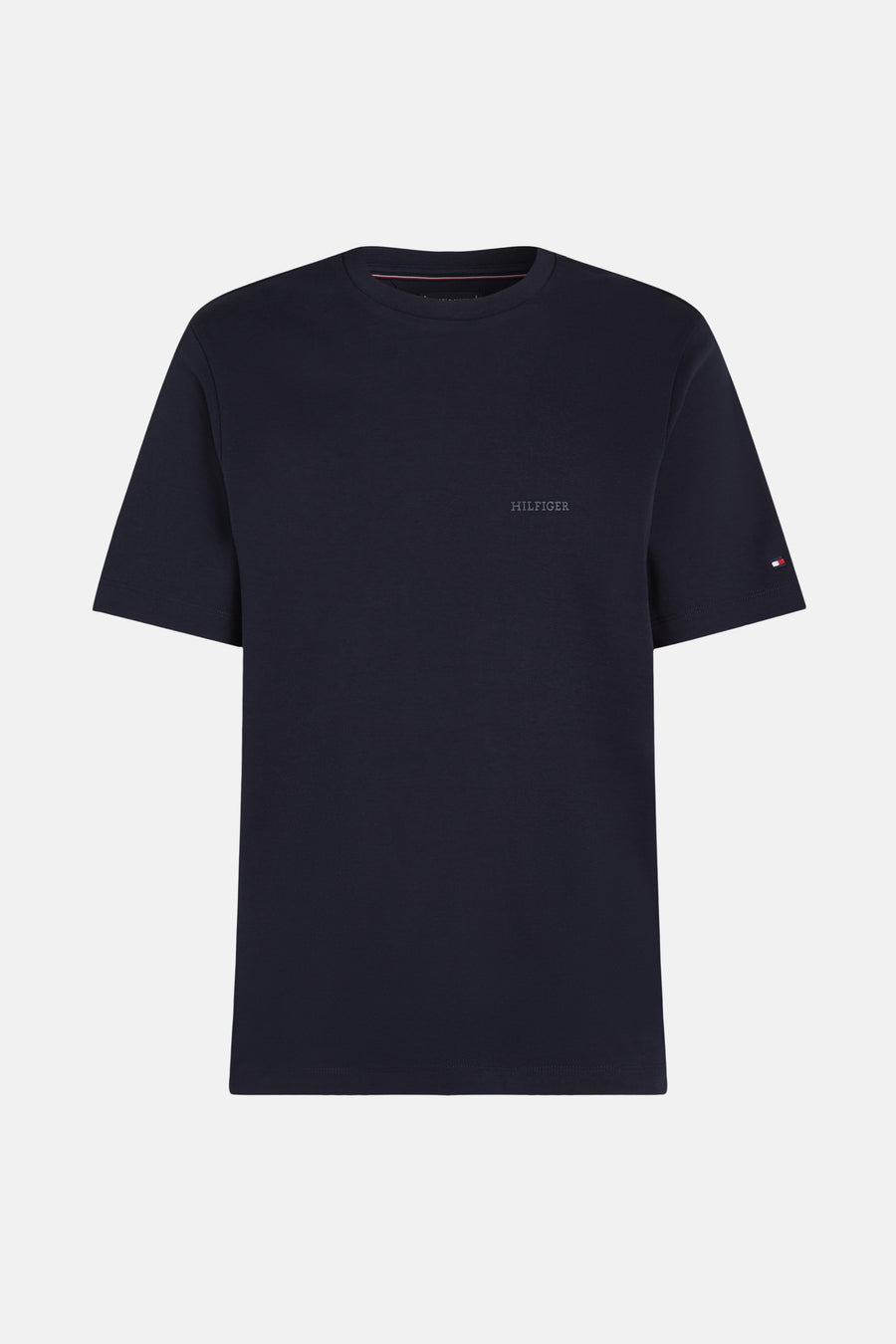 T-shirt bleu à manches courtes de Tommy Hilfiger, avec logo discret sur la poitrine et drapeau iconique sur la manche.