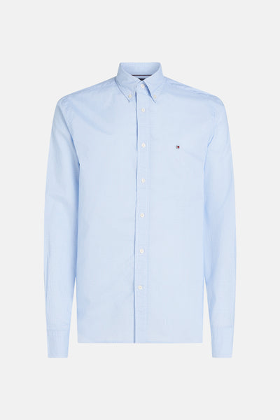 Chemise à manches longues bleue en coton par TOMMY HILFIGER, avec un motif tissé subtil et un logo brodé.
