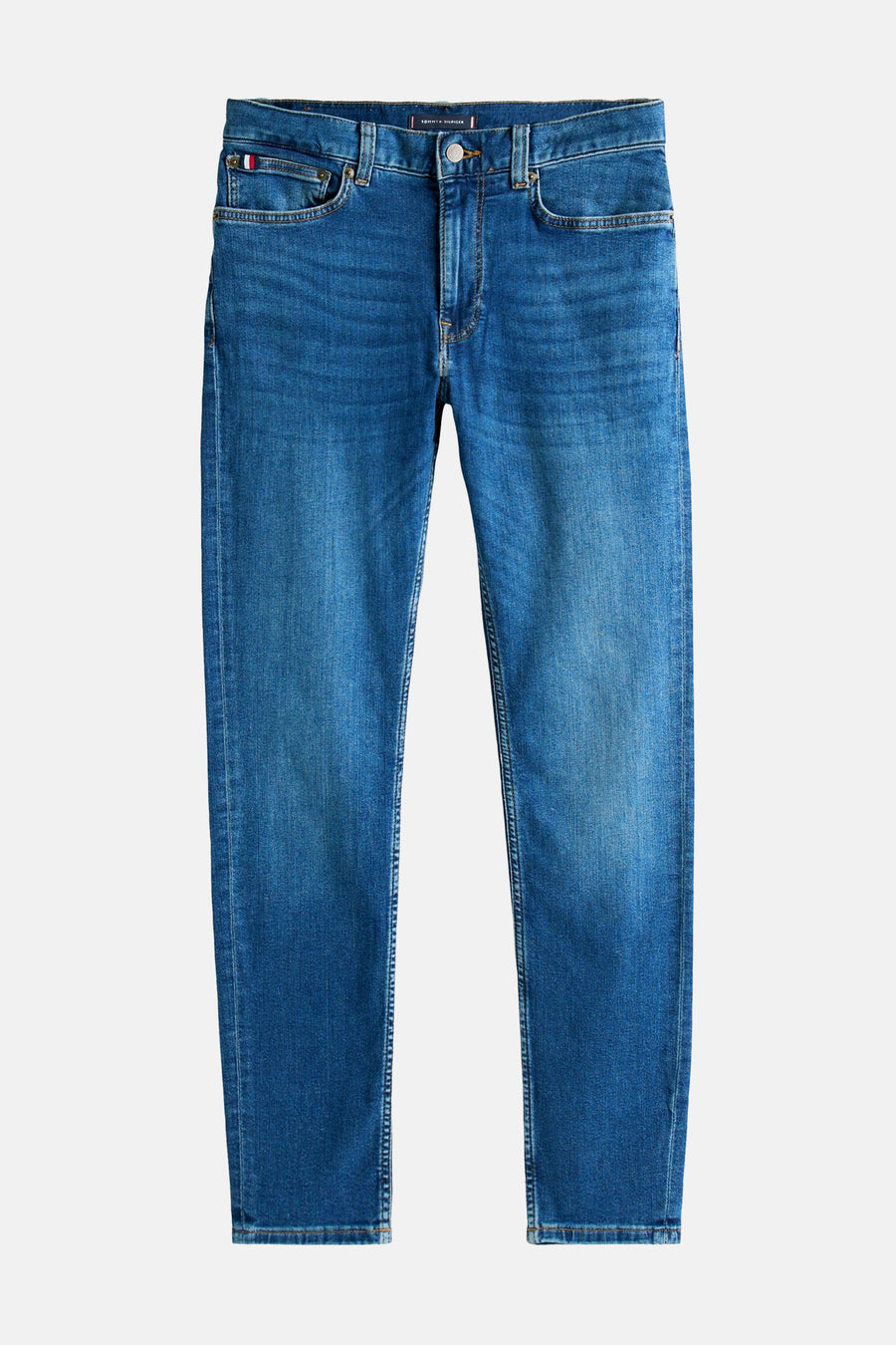 Jean slim en denim bleu moyen de Tommy Hilfiger, coupe droite et détails de poches classiques.