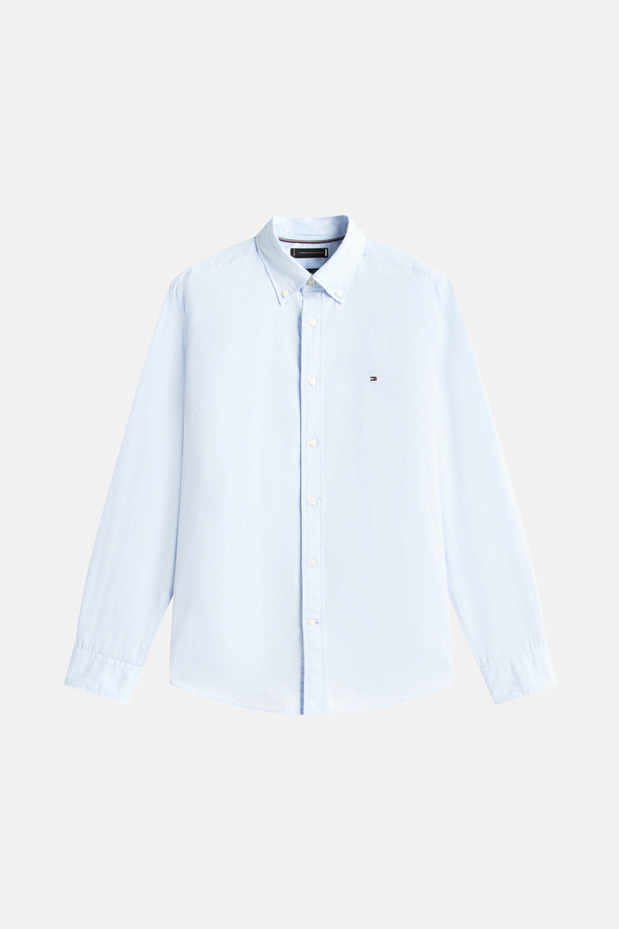 Chemise bleu à manches longues de TOMMY HILFIGER, avec logo discret sur la poitrine.