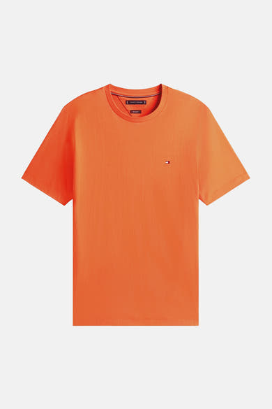 T-shirt orange à manches courtes de TOMMY HILFIGER, avec un petit logo drapeau sur la poitrine.
