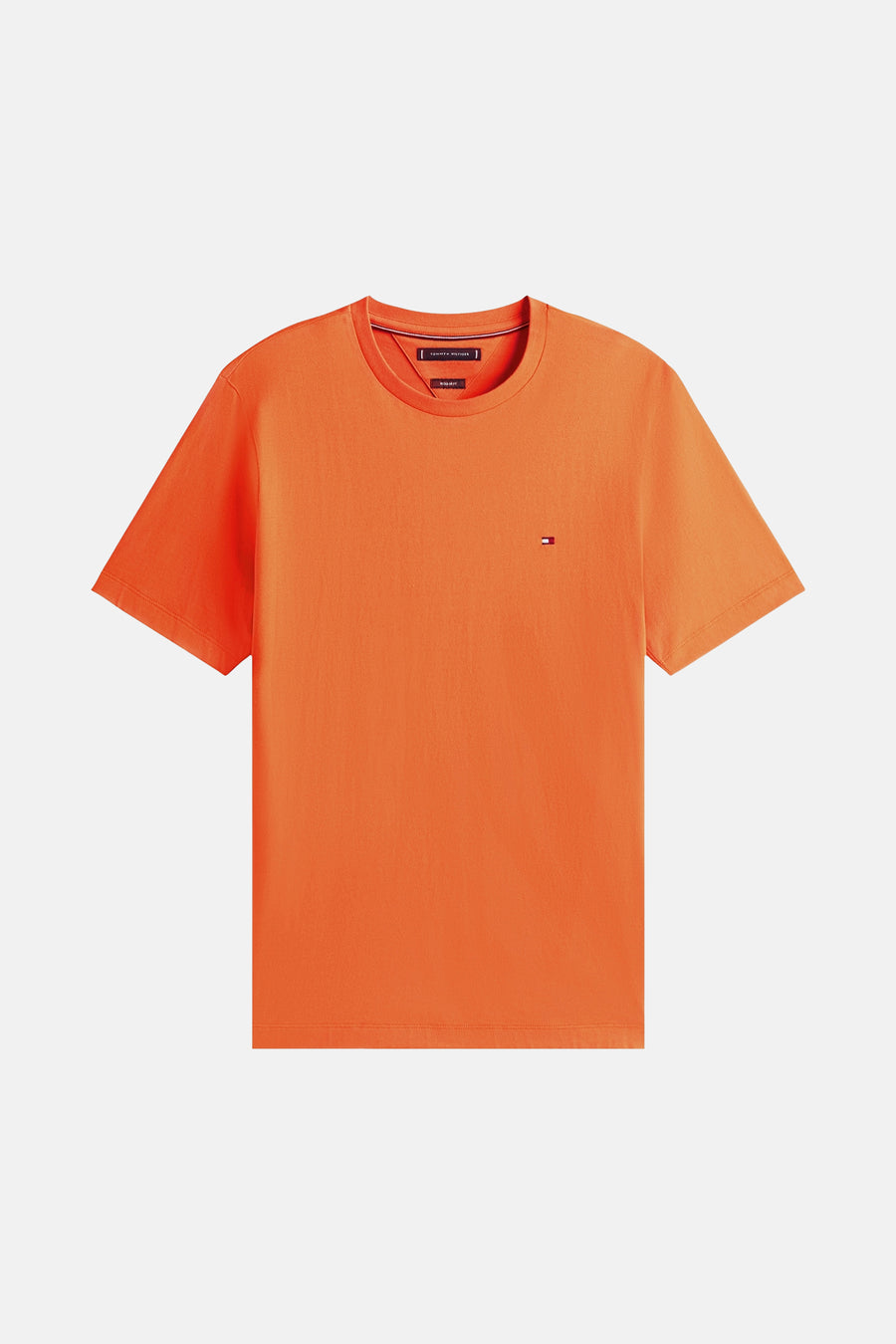 T-shirt orange à manches courtes de TOMMY HILFIGER avec logo sur la poitrine.