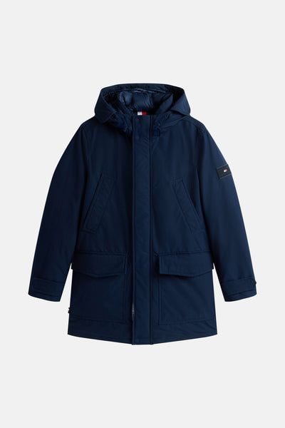 Veste de pluie bleue de Tommy Hilfiger avec capuche et poches plaquées.