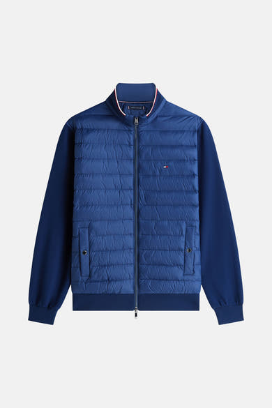 Veste bleue de TOMMY HILFIGER, avec fermeture éclair, à manches longues et deux poches latérales.