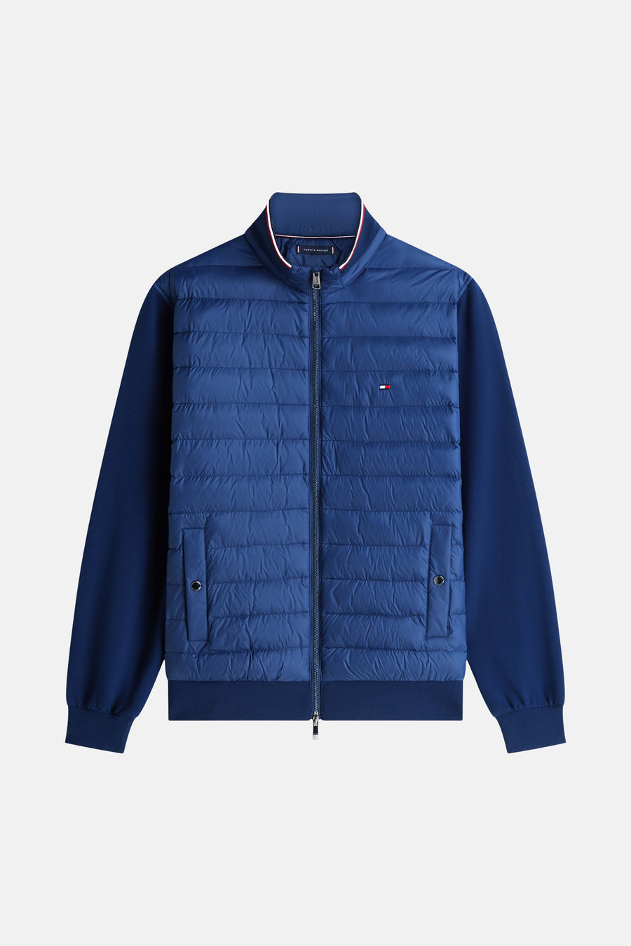 Veste bleue de TOMMY HILFIGER, avec fermeture éclair, à manches longues et deux poches latérales.