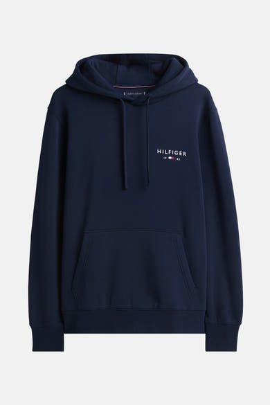 Sweat à capuche bleu marine de Tommy Hilfiger, avec cordon de serrage et poche kangourou.