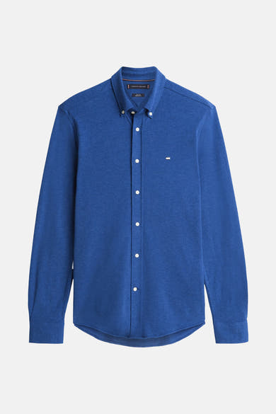 Chemise à manches longues bleue de TOMMY HILFIGER, avec des boutons blancs et un logo subtil sur la poitrine.